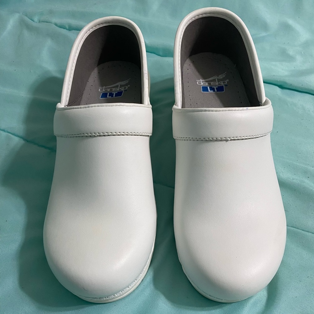 Only worn twice. NO scratches or worn marks. Dansko LT Pro.